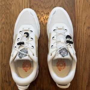 White Sneakers with Black and Orange Accents